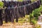 The washed socks are hung on the rope. Dry socks are dried on the street.Hanging clothes drying outdoors