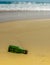 Washed up bottle on beach