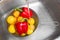 Washing colorful fruits and vegetables