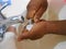 Washing Hand Fingernails with Brush