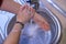 Washing hands and arms properly. Rubbing with soap and water. Hygiene concept. High angle