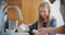 Washing hands, child and dad blowing foam in a kitchen and home with happiness and bonding. Smile, father and young girl