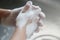 Washing hands with foam cleaning for personal hygiene