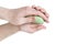 Washing hands with soap  on white background close-up. Man holds a bar of soap in his hands. Please wash your hands