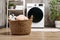 Washing machine in a gray modern laundry room close up