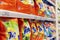 Washing powders on the shelves in the store. Large selection of household chemicals. Side view. Moscow, Russia, 03-04-2021