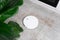 Washing White robot vacuum cleaner device cleaning floor from crumbs groats at home