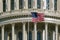 Washington DC Capitol detail with american flag