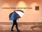 Washington, DC - June 04, 2018: Pedestrian with an umbrella near