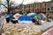 Washington, DC, USA - Feb. 14, 2020: homeless tents covered in ice in winter in the middle of the city