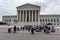 Washington DC, USA - June 9, 2019: Tourists on the  stairs of Supreme Court of the United States of America - image