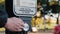 Washington DC, USA, October 2017: A man`s hand presses a button on a traffic light to cross the road