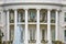 Washington DC, USA. White House detail with fountain and columns background.