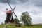 Wasserschoepfmuehle Wynhamster Kolk. East Frisian landscape with mill near the town of Leer, East Frisia, Lower Saxony, Germany