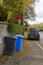 Waste bins awaiting collection outside Drumbo Parish Church in the County Down village of Drumbo in Northern Ireland