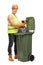 Waste collector emptying a garbage bin