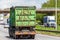 Waste tipper lorry truck on uk motorway in fast motion