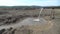 Waste water discharge and heaps of ash and slag waste at ash dump of thermal power