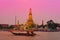 Wat Arun across Chao Phraya River during sunset