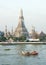 Wat Arun by Chao Phraya river in Thailand