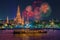 Wat arun and cruise ship in night time under new year celebration, Bangkok city ,Thailand