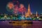 Wat arun and cruise ship in night time under new year celebration, Bangkok city ,Thailand