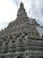 Wat Arun, locally known as Wat Chaeng, is a landmark temple on the west & x28;Thonburi& x29; bank of the Chao Phraya river.