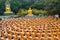 Wat Chak Yai temple, golden buddha and hundreds of monks, in Chanthaburi, Thailand