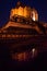 Wat Chedi Luang temple of the royal stupa reflection in the water at night  Chiang Mai City Thailand