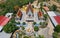 Wat Khao Sung Chaem Fa temple with giant snake and reclining gold buddha, in Kanchanaburi, Thailand