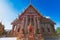 Wat Phrom Rangsi, Lopburi, Thailand : This temple has an ubosot with four porches. The bell-shape chedi is similar to the Phra