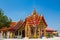 Wat in Thailand beautiful decorated with high towers roof