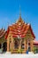 Wat in Thailand beautiful decorated with high towers roof