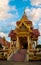 Wat in Thailand beautiful decorated with high towers roof