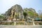 Wat Tham Khao Yoi is a beautiful temple adjacent to the rocky mountains of Phetchaburi Province