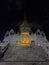 Wat Traimit Withayaram Worawihan. Temple in Bangkok, Thailand.  Night scenery.  Vertical