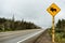 Watch out for moose. Warning yellow sign and Canadian highway