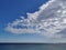 Watching gorgeous cumulus clouds blue sky with amazing horizon seascape