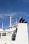 Watchtower, antennas, radar and  other communication and navigation equipment on the command bridge of a ship