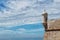 Watchtower of the fortress on the beach in Sesimbra village