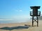 Watchtower and his shadow on the sand.