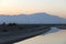 Water aqueduct canal drainage reservoir channel evening dusk desert mountains reflections