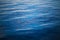 Water background. Calm ocean water surface with small waves and riffles