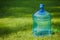 Water big bottle on grass