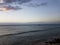 Water and boats and sand and rocks in Aguadilla, Puerto Rico