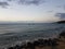 Water and boats and sand and rocks in Aguadilla, Puerto Rico