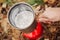 Water is boiling in a pot on a gas burner