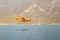 Water bomber firefighting plane over Garda Lake