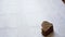 Water and bread food elderly lonely person theme. Close-up of an old man`s hands holding a glass of water washing down rye bread w