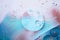 Water bright oil bubble macro abstract background flow liquid blue pink white aqua